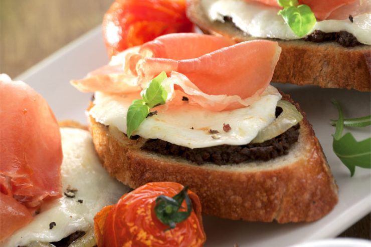 sliced bayonne ham appetizer on french bread