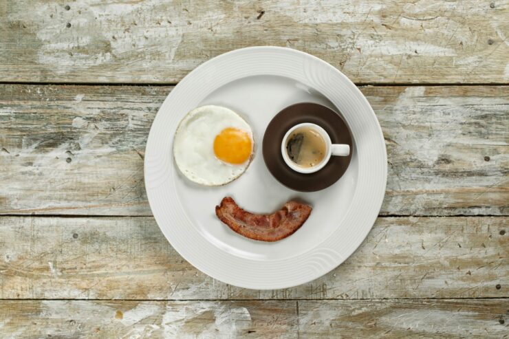 smiley face eggs bacon and coffee