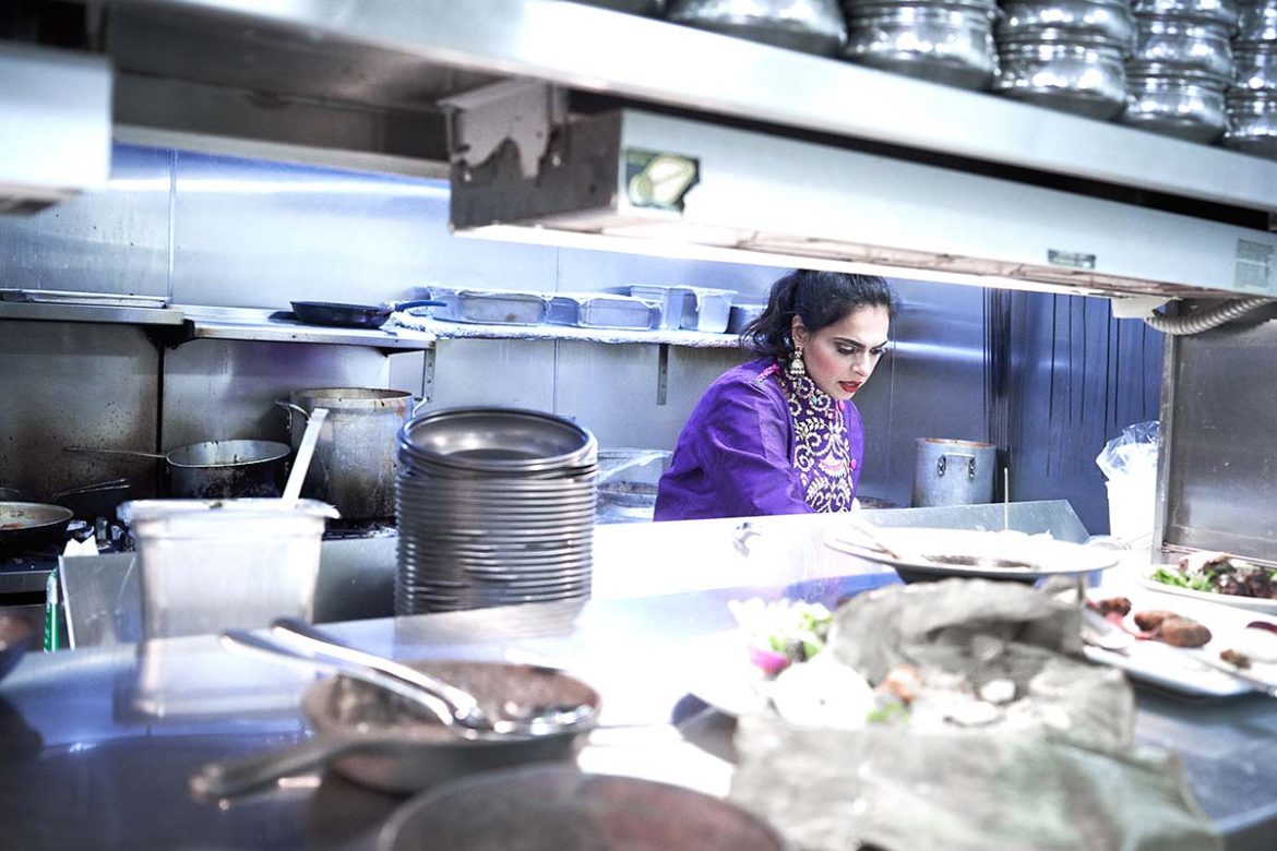 Maneet Chauhan cooking in restaurant