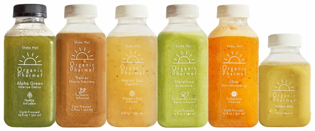 six front-facing bottles of organic pharmer juices in a line