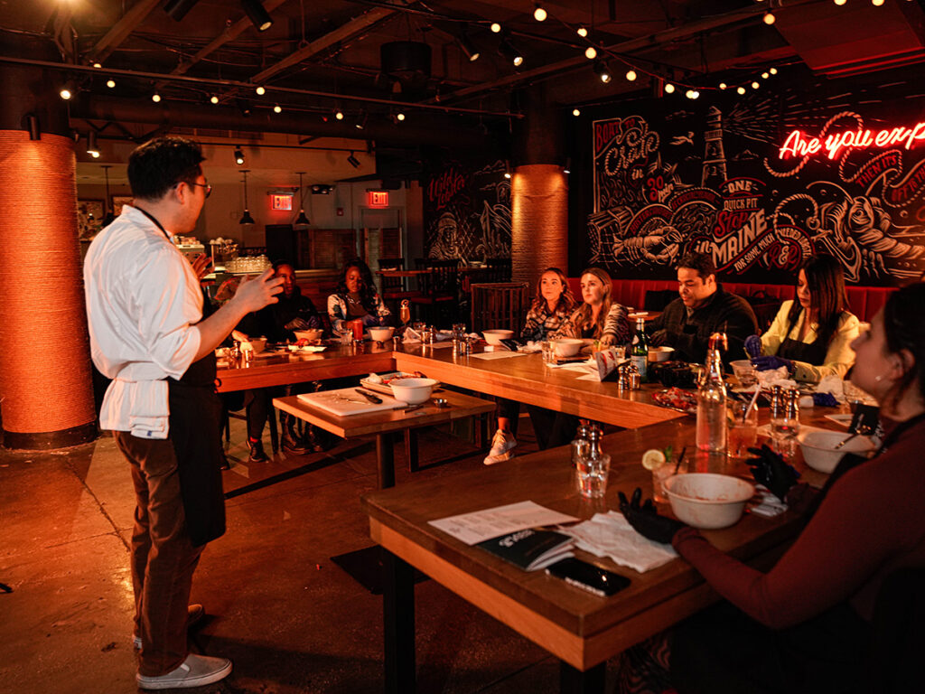 chef danny lee teaching a masterclass on lobster