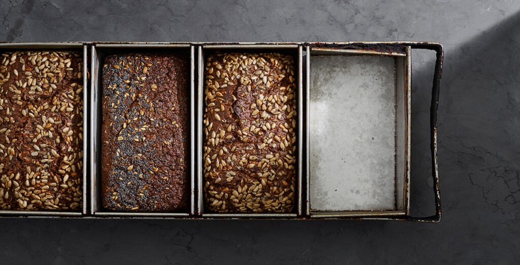 rye breads from ole & steen still in their pans