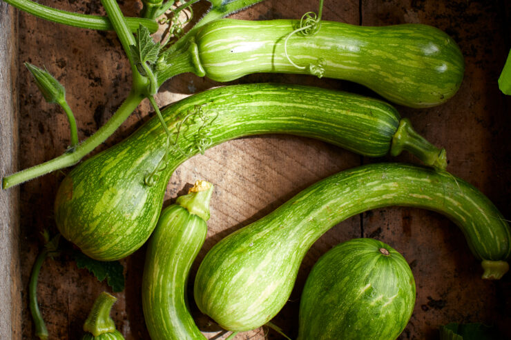 summer squash on a wooden surface