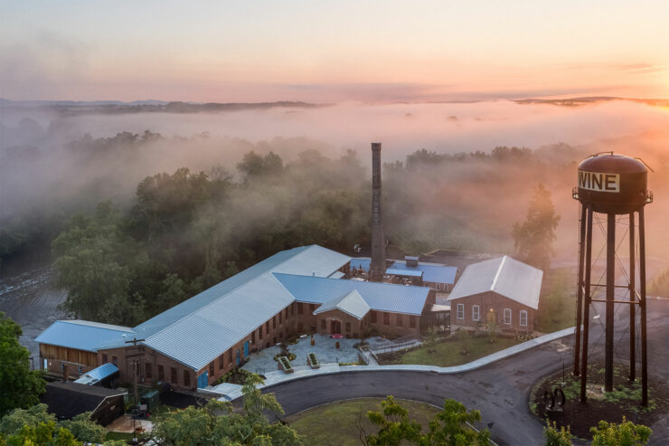 a drone image of city winery hudson valley on a foggy day