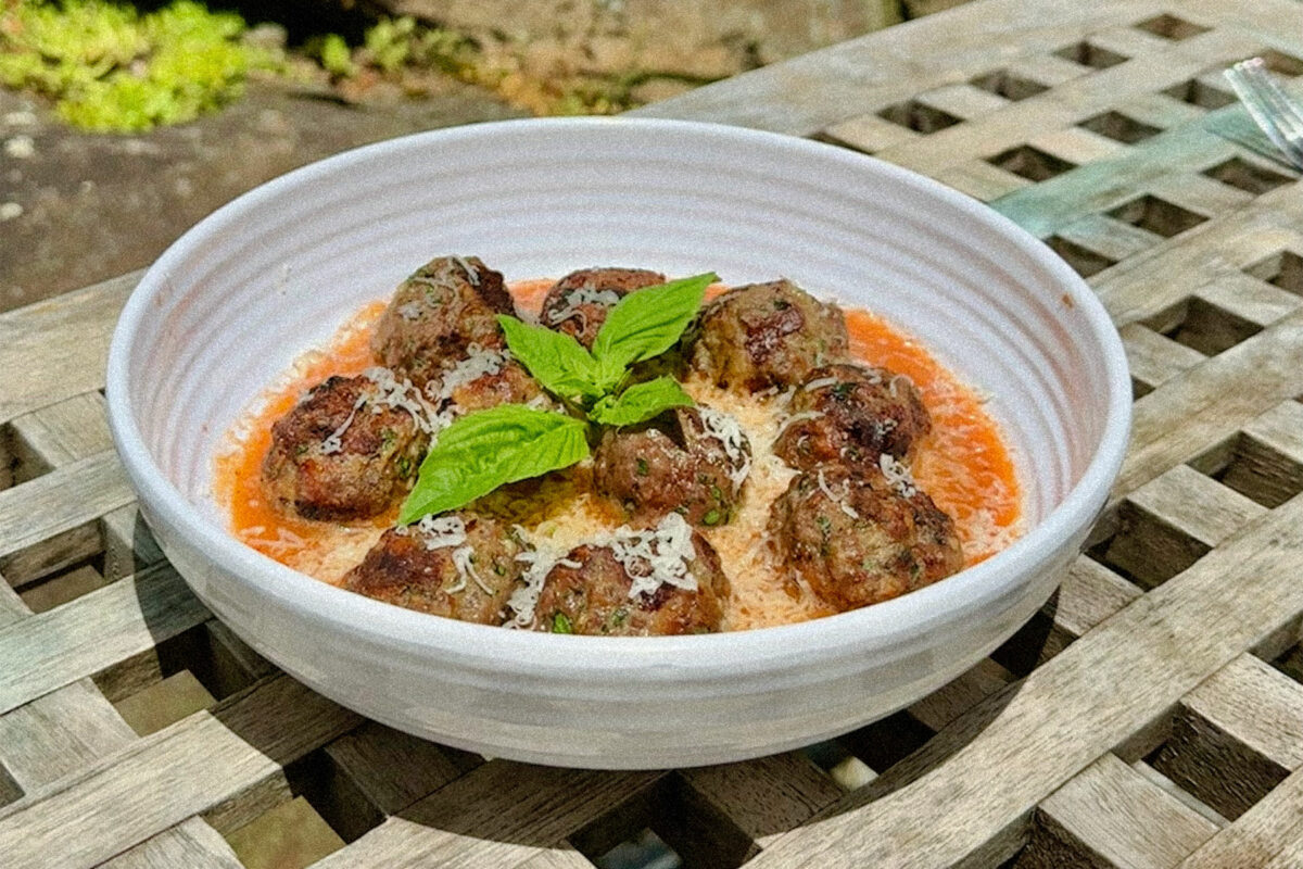 a bowl of meatballs in sauce