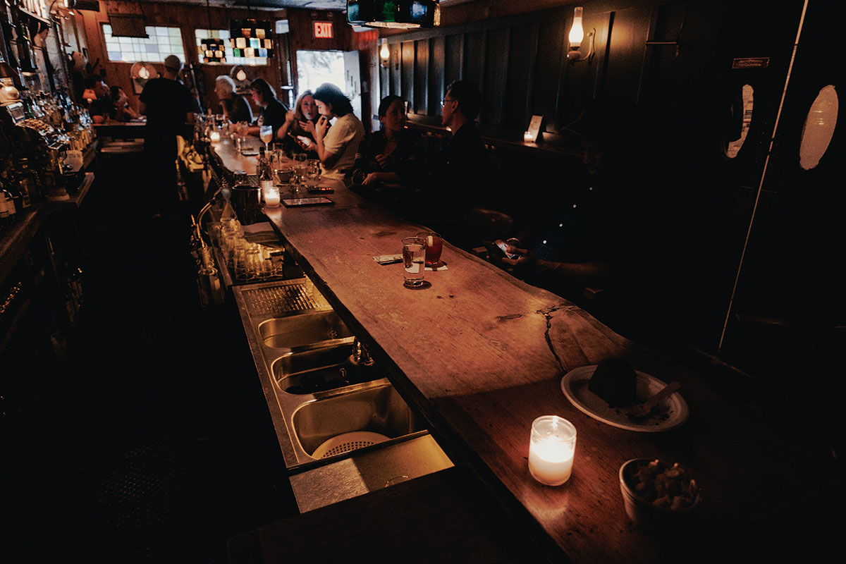 a dark scene at dyncao bar in brooklyn