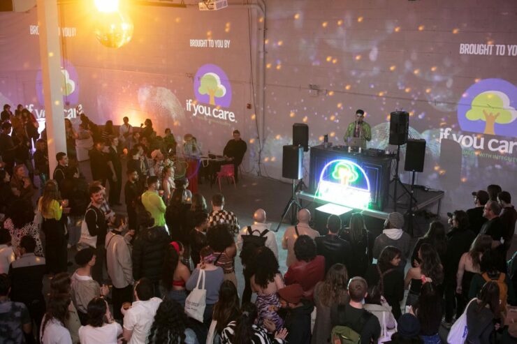 a crowd gathers at a disco themed party